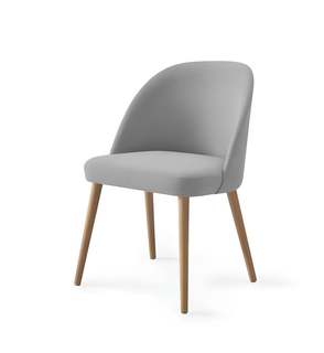 Butaca tapizada M-200 - Butaca/silla de comedor M-200, de madera de pino o de haya, con asiento y respaldo tapizado en varias telas.