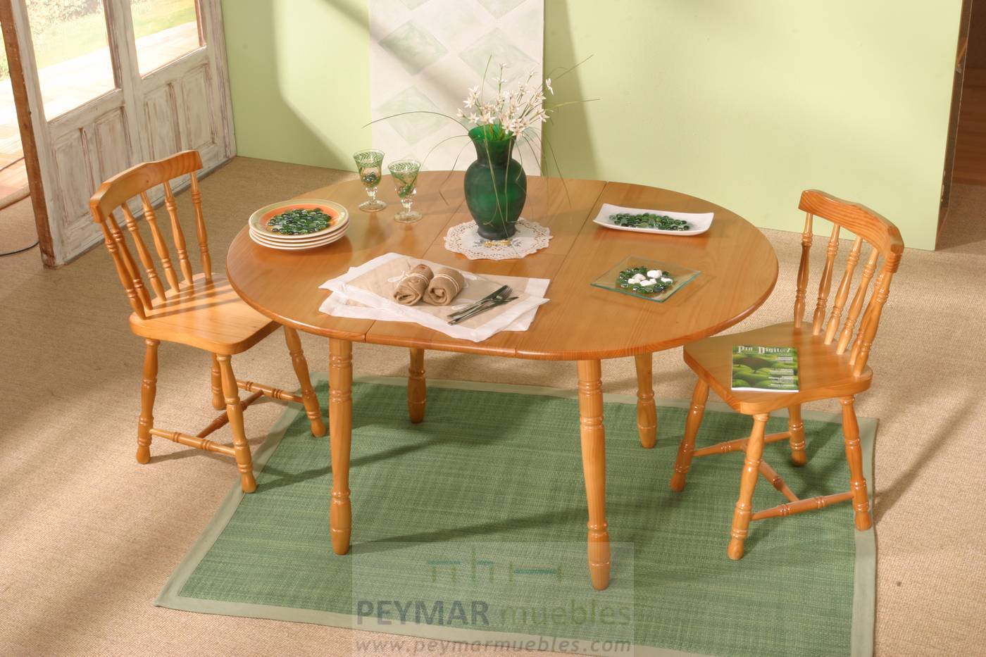 Mesa Redonda Extensible - Mesa de comedor redonda extensible, con patas torneadas. Fabricada de madera de pino maciza en varios colores.