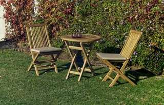 Conjunto Teka Seroni 70-2 de Hevea - Conjunto de madera de teka: 1 mesa redonda plegable 70 cm. + 2 sillas con cojines asiento