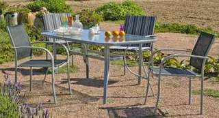 Set Acero Antillas 150-4 de Hevea - Conjunto de acero color plata: mesa de 150x90 cm. Con tablero de cristal templado + 4 sillones de acero y textilen
