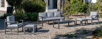 Sofá 3p + sillones + taburetes de aluminio [Fenix] de Hevea - Conjunto de aluminio para jardín: 1 sofá 3 plazas + 2 sillones + 1 mesa de centro + 2 reposapiés. Disponible en cinco colores diferentes.