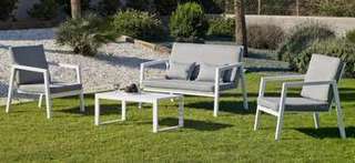 Set de aluminio: sofá 2p + sillones + mesa [Ágata] de Hevea - Conjunto de aluminio apilable para jardín: 1 sofá de 2 plazas + 2 sillones + 1 mesa de centro. Disponible en color blanco, antracita, champagne, plata, marrón o nude.