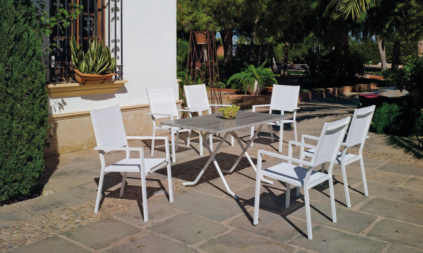 Conjunto aluminio color blanco: mesa rectangular plegable de 140 cm. con tablero de heverzaplus + 6 sillones de aluminio y textilen