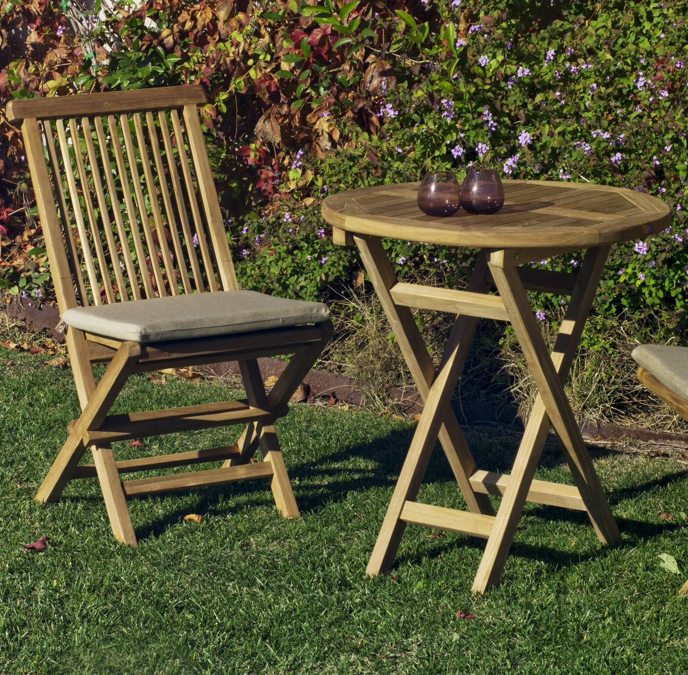Conjunto Teka Seroni 70-2 - Conjunto de madera de teka: 1 mesa redonda plegable 70 cm. + 2 sillas con cojines asiento