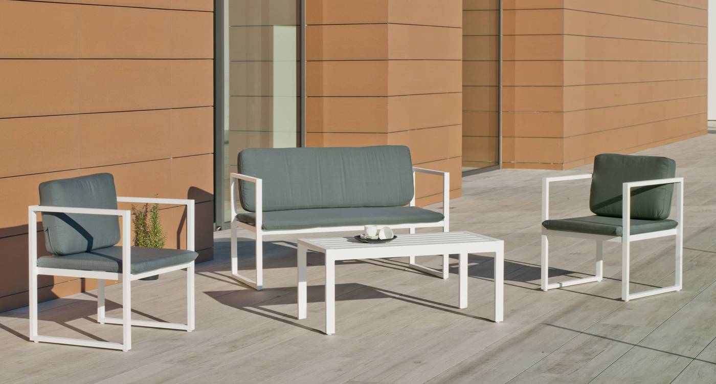 Conjunto de aluminio apilable: sofá 2 plazas + 2 sillones + mesa de centro + cojines. Disponible en color blanco o antracita.